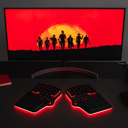 Black Dygma Defy with black keycaps and red RGB