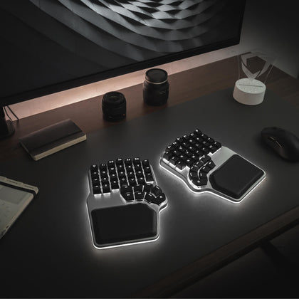 Silver Dygma Defy with black keycaps white RGB