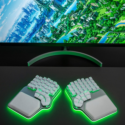 Silver Dygma Defy with white keycaps and green RGB