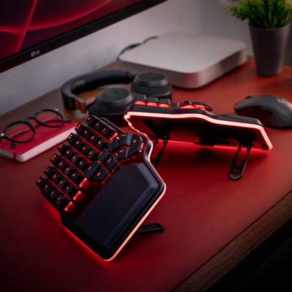 Black Dygma Defy with black keycaps red RGB